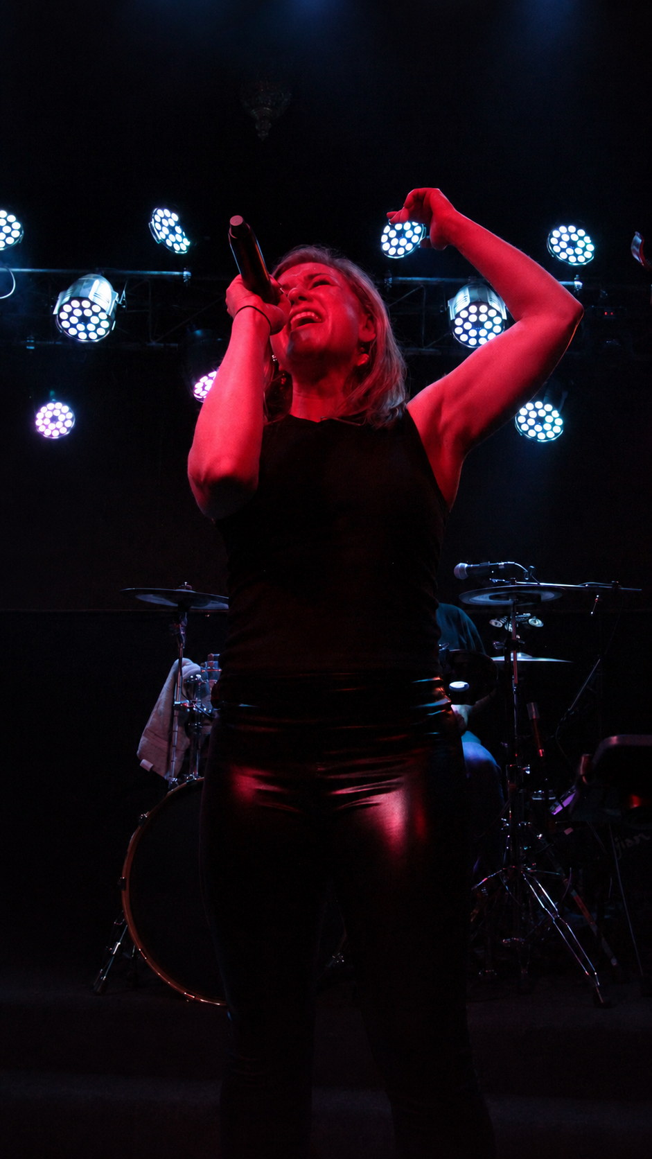Christa delivering a powerful vocal performance