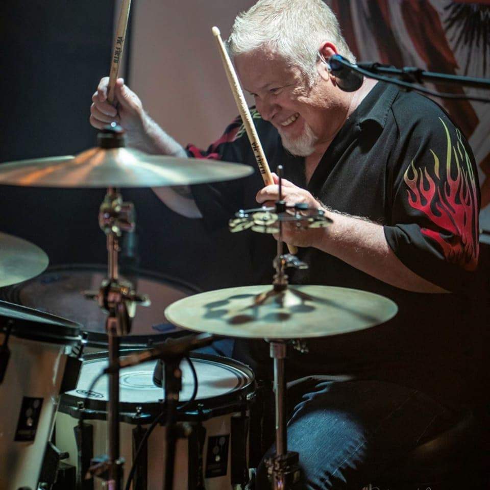 Mark in action on drums